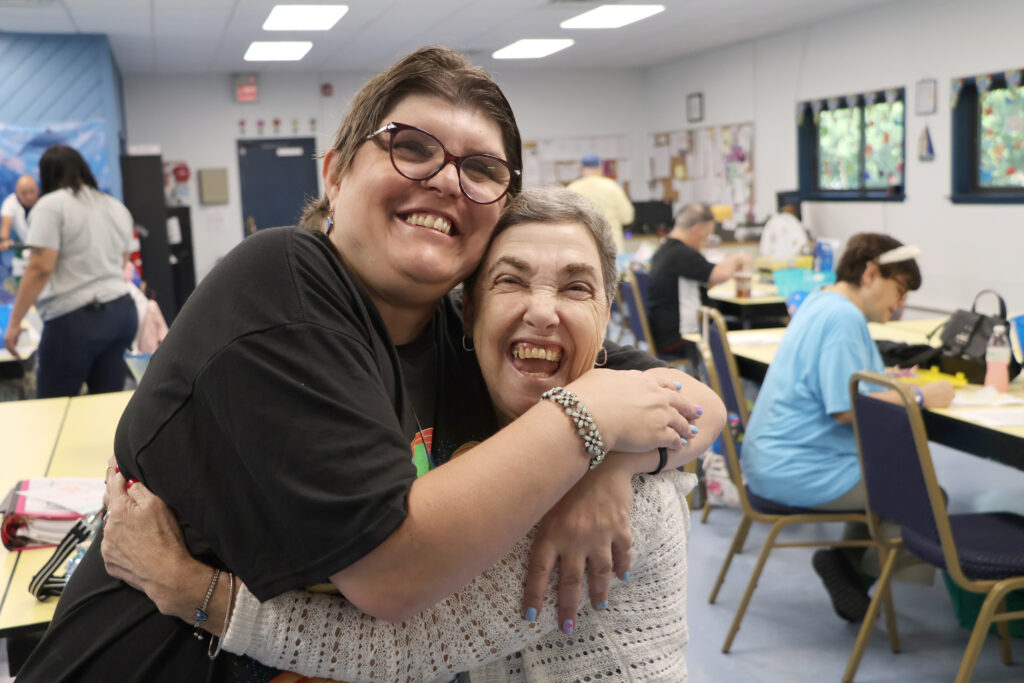 Two women hugging